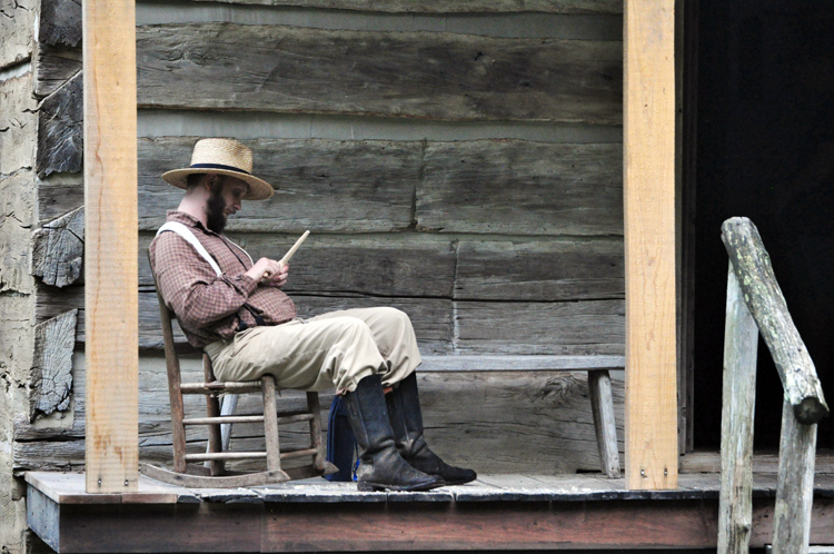 whittler on porch